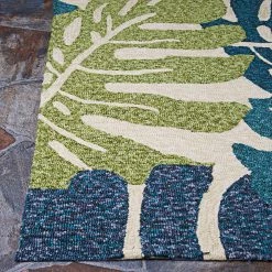 Covington Monstera Cream-Multi 6 ft. x 8 ft. Indoor/Outdoor Area Rug by Couristan -Artistic Weavers || Couristan Sales Store cream multi couristan outdoor rugs 35341521056080t 4f 1000