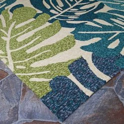 Covington Monstera Cream-Multi 6 ft. x 8 ft. Indoor/Outdoor Area Rug by Couristan -Artistic Weavers || Couristan Sales Store cream multi couristan outdoor rugs 35341521056080t c3 1000