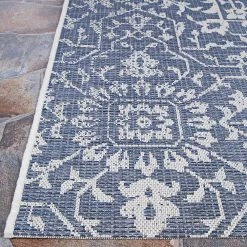 Monte Carlo Palmette Navy-Ivory 7 ft. 6 in. x 10 ft. 9 in. Indoor/Outdoor Area Rug by Couristan 12 Monte Carlo Palmette Navy-Ivory 7 ft. 6 in. x 10 ft. 9 in. Indoor/Outdoor Area Rug by Couristan -Artistic Weavers || Couristan Sales Store navy ivory couristan outdoor rugs 23296427076109t 4f 1000