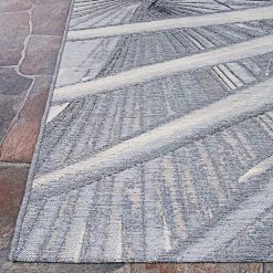 Dolce Kalamiaris Palms Silver 8 ft. x 11 ft. Indoor/Outdoor Area Rug by Couristan -Artistic Weavers || Couristan Sales Store silver couristan outdoor rugs 55840270081112t 4f 1000